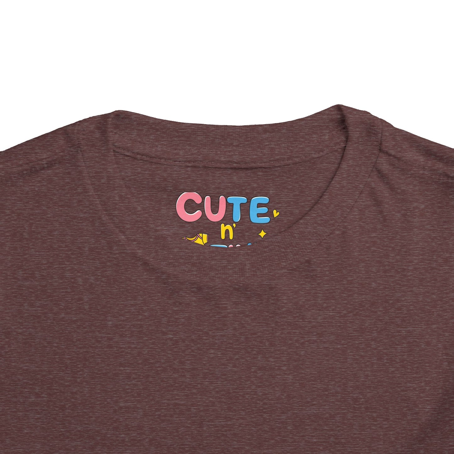 Brown t-shirt with 'CUTE n' text in colorful letters on a white background