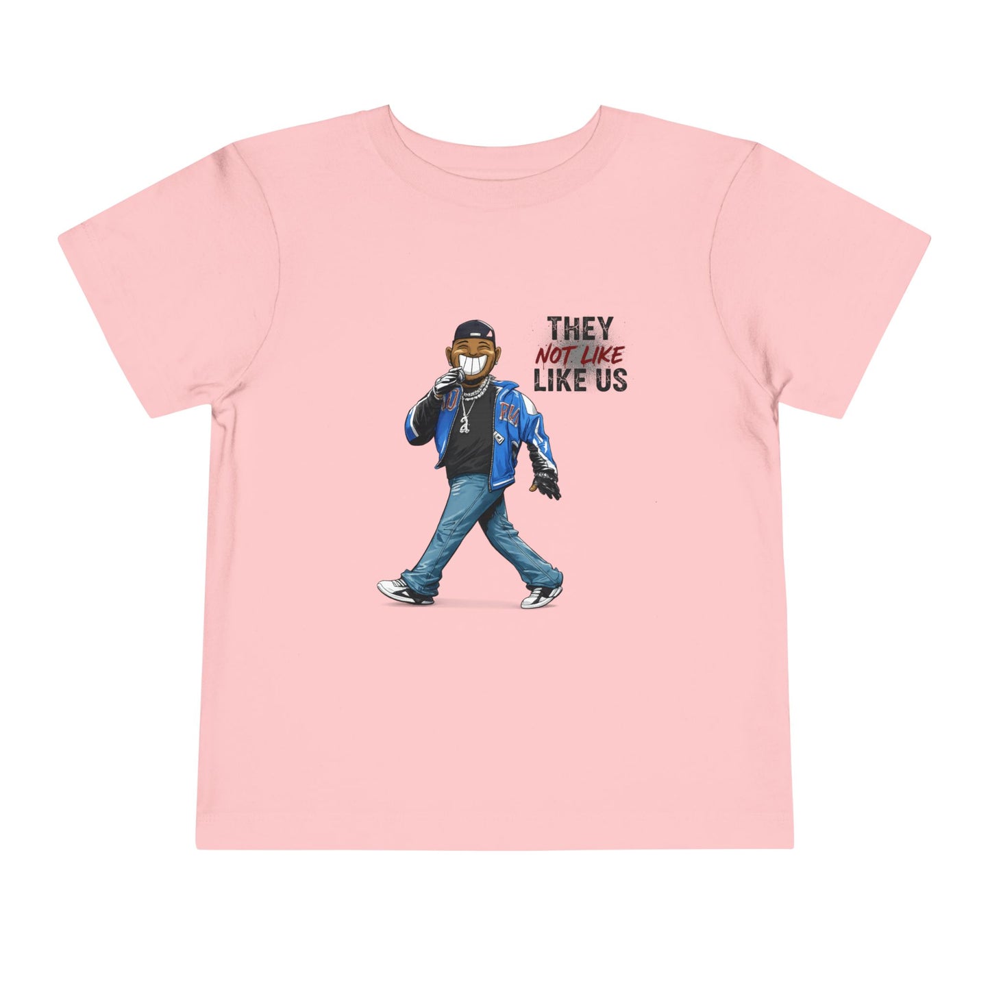 Pink t-shirt with a graphic of a person wearing a mask and text 'THEY NOT LIKE US' on a white background