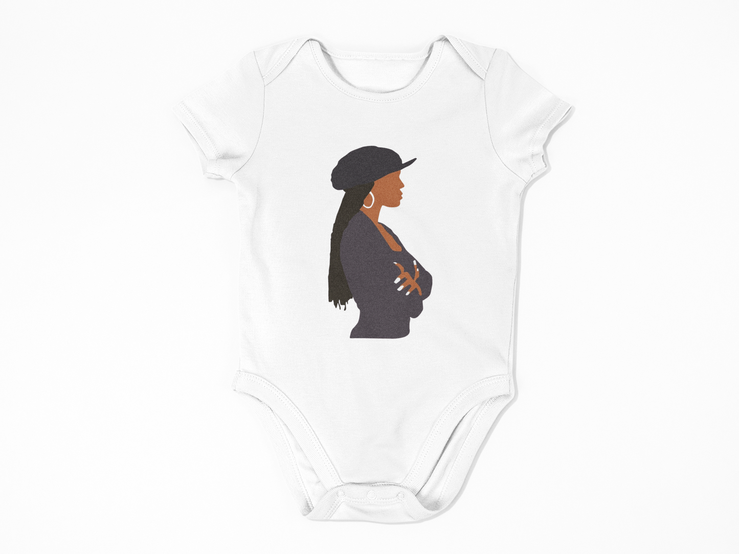 White baby onesie with a graphic of a woman wearing a cap on a white background