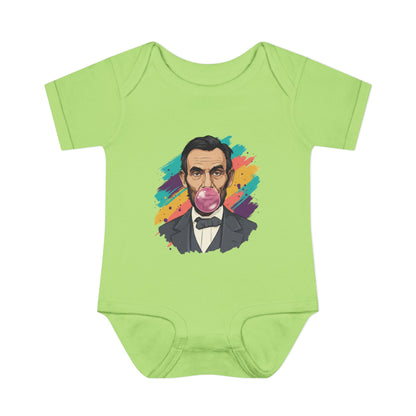 Green baby onesie with a colorful graphic of a historical figure on a white background