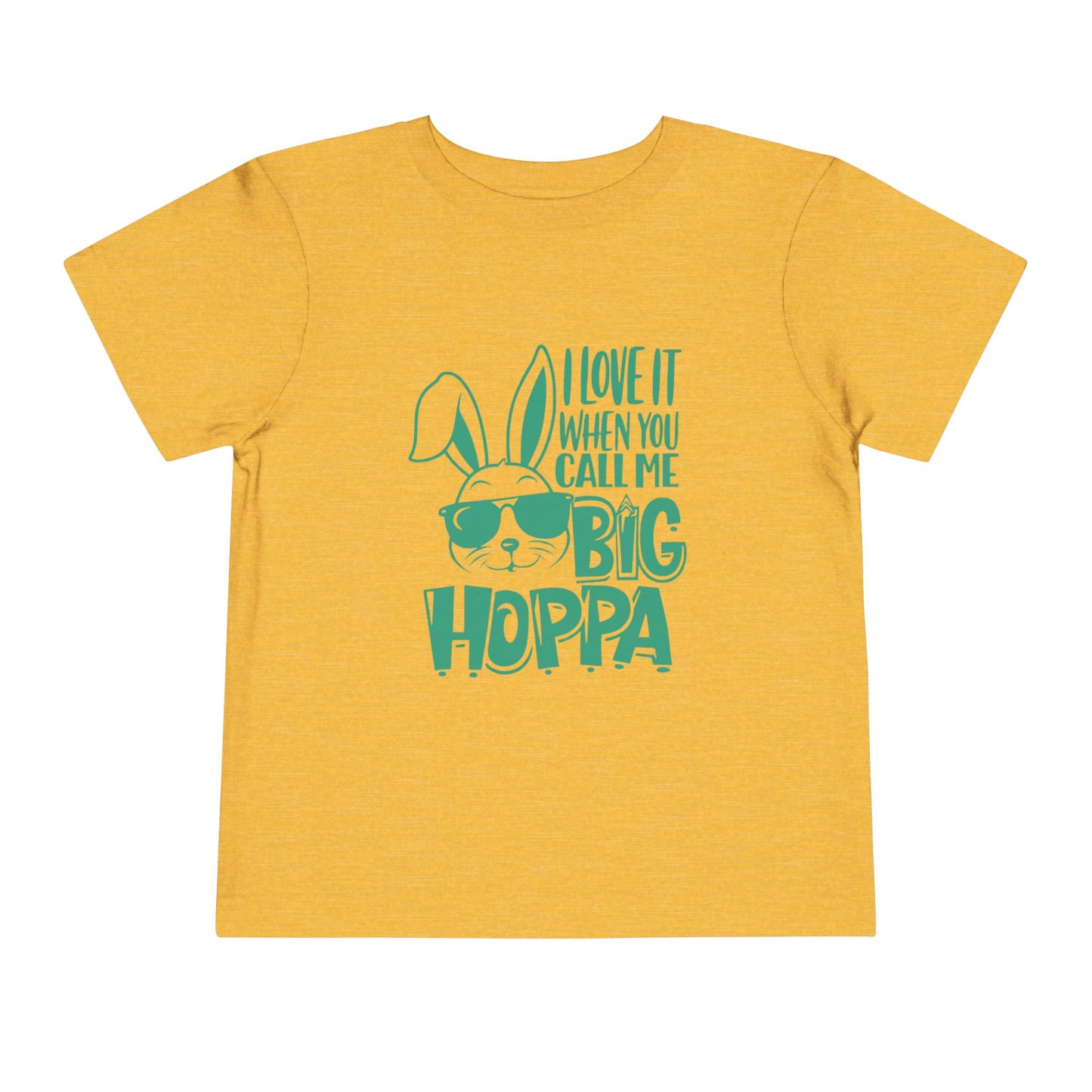Yellow t-shirt with green text and graphic on a white background
