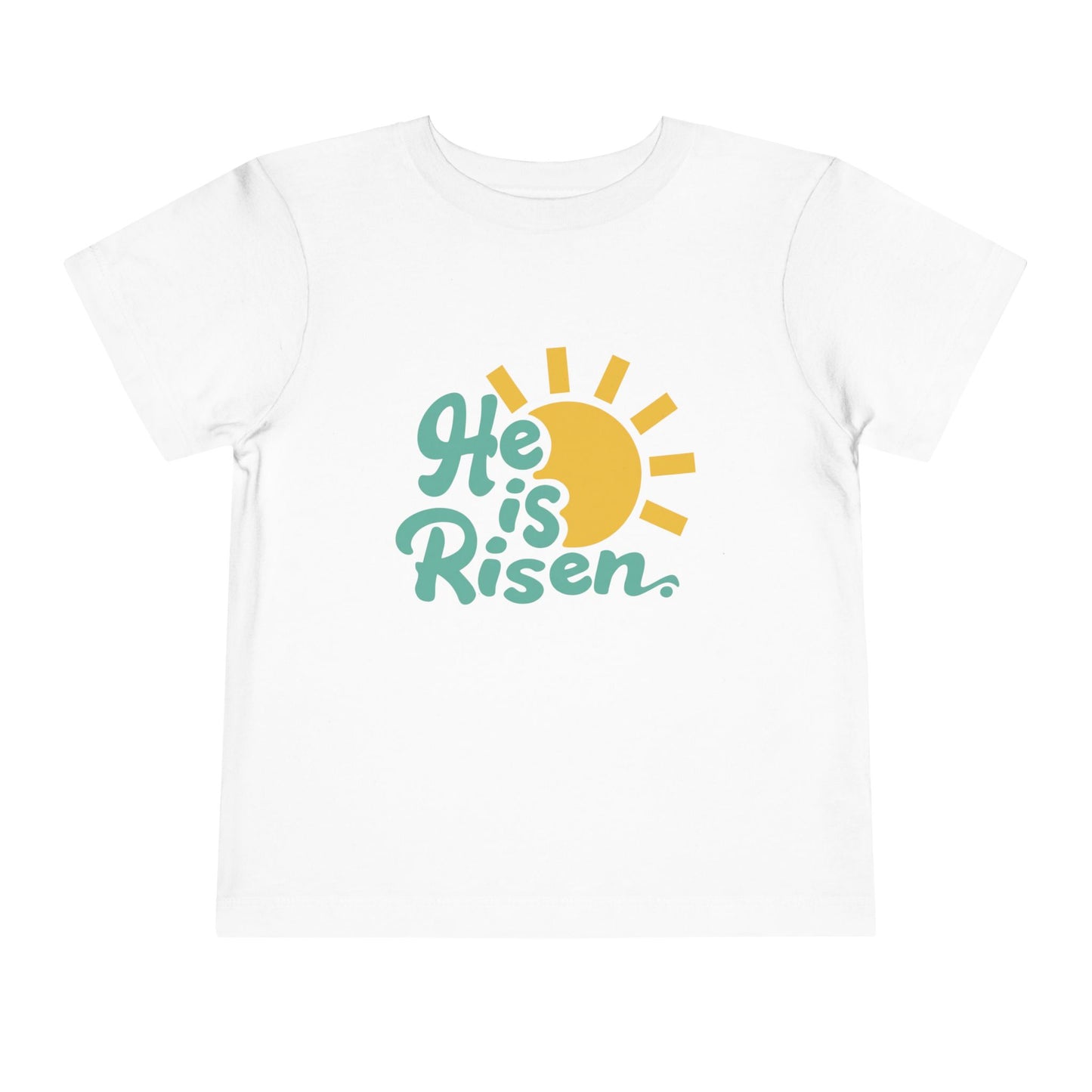 White t-shirt with 'He is Risen' text and sun graphic on a white background