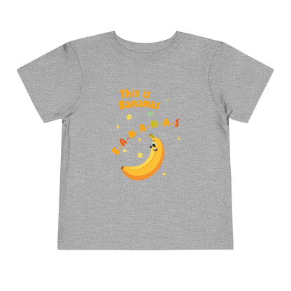 Gray t-shirt with a banana graphic and text on a white background
