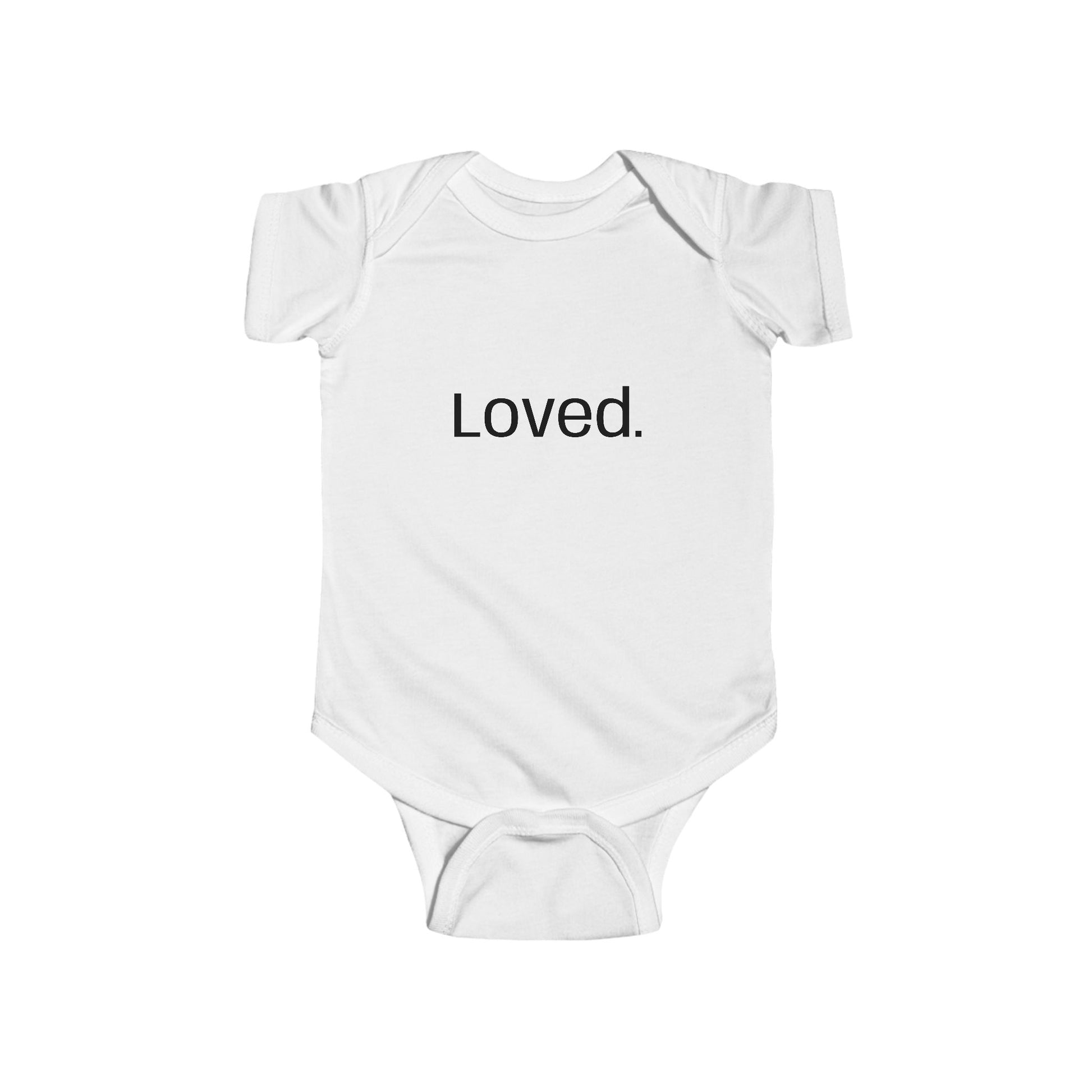 White baby onesie with 'Loved' text on a white background