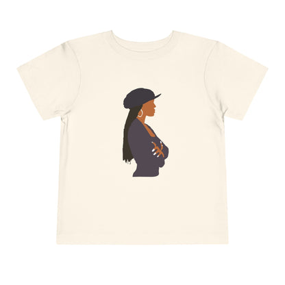 Beige t-shirt with a graphic of a woman wearing a hat on a white background