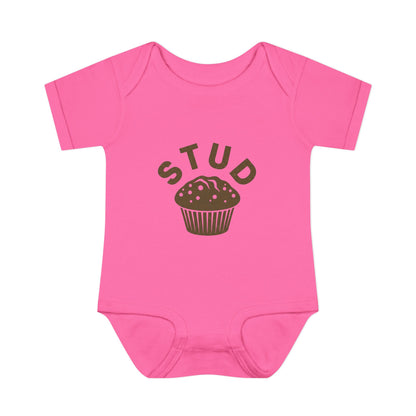 Pink baby onesie with 'STUD' and a cupcake graphic on a white background