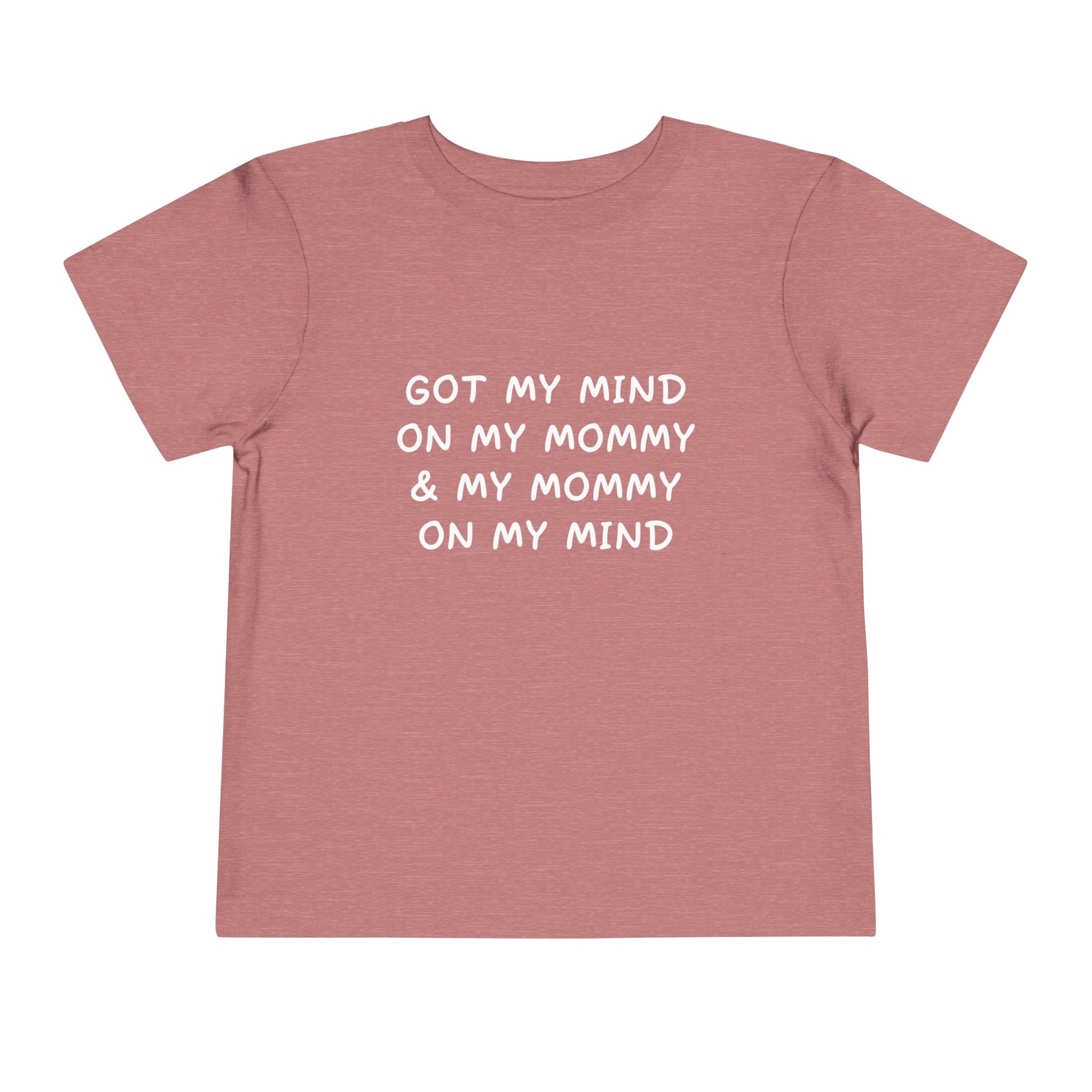 Pink t-shirt with white text on a white background