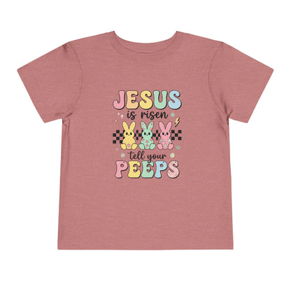Mauve t-shirt with colorful Easter text and bunny graphics on a white background