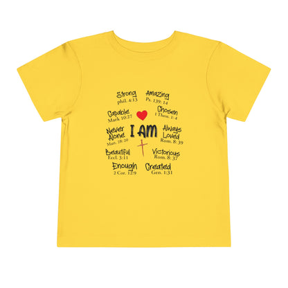 Yellow t-shirt with motivational text and a red heart on a white background