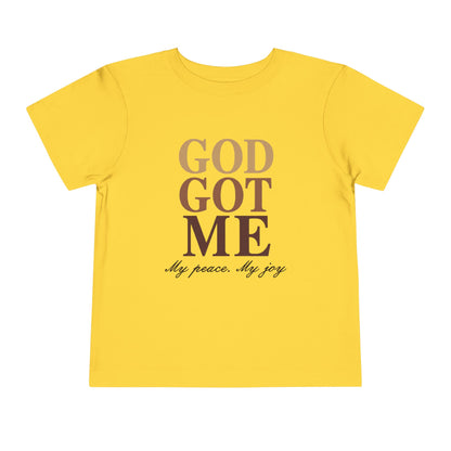 Yellow t-shirt with 'GOD GOT ME My peace. My joy' text on a white background
