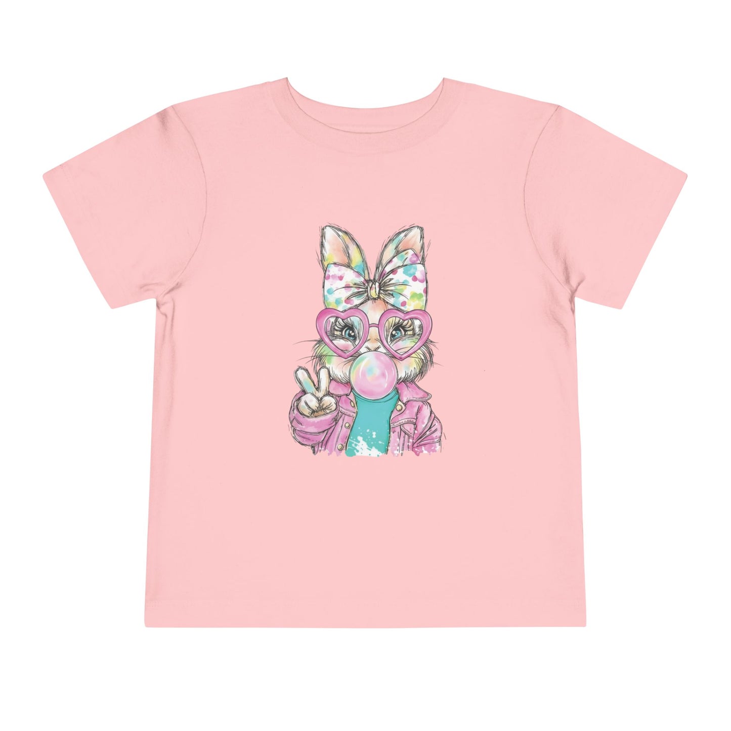 Pink t-shirt with a cartoon character wearing glasses and a bow on a white background