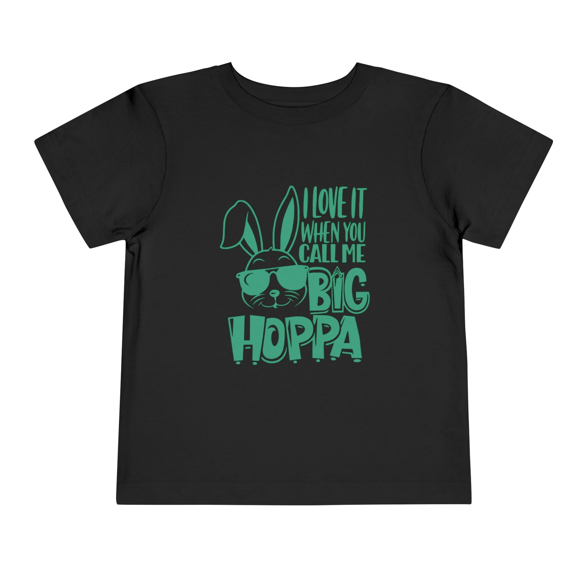 Black t-shirt with green text and bunny graphic on a white background