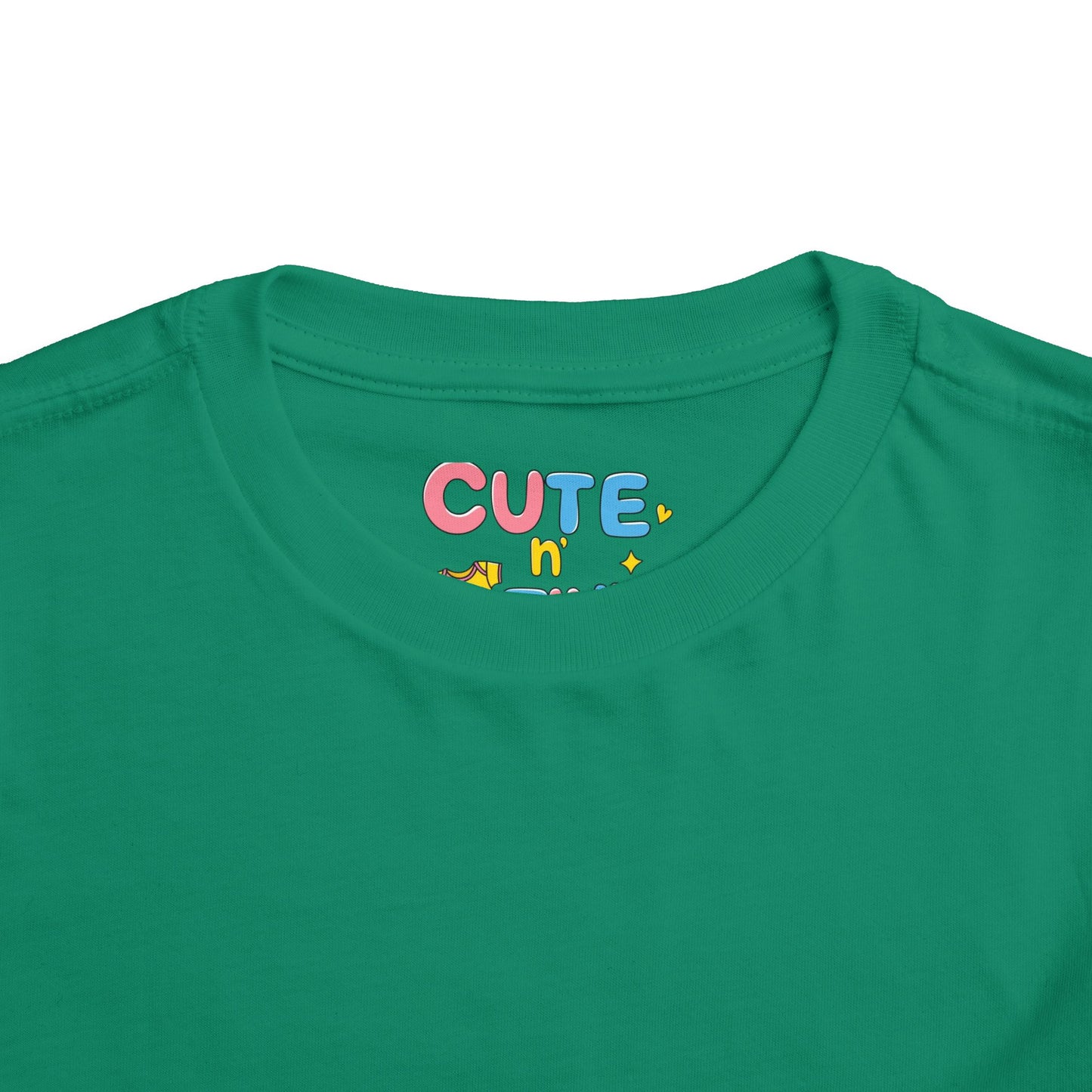 Green shirt with colorful 'CUTE n' text on a white background