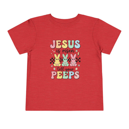 Red t-shirt with colorful Easter text and bunny graphics on a white background