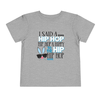 Gray t-shirt with colorful text and graphic design on a white background