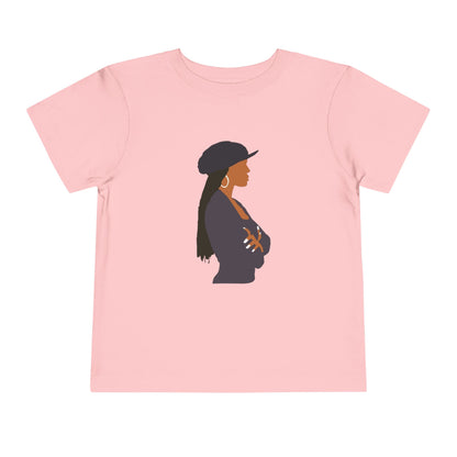 Pink t-shirt with a silhouette of a woman wearing a hat on a white background