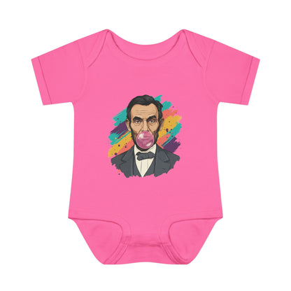 Pink baby onesie with a colorful graphic of Abraham Lincoln on a white background