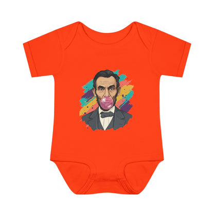 Orange baby onesie with a colorful graphic of a historical figure on a white background