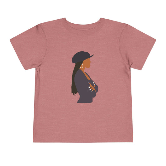 White t-shirt with a graphic of a woman wearing a hat on a white background