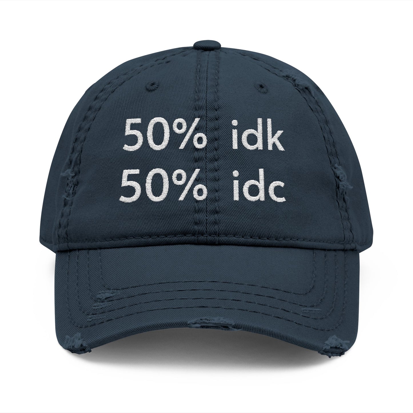 Navy blue cap with white text '50% idk 50% idc' on a white background