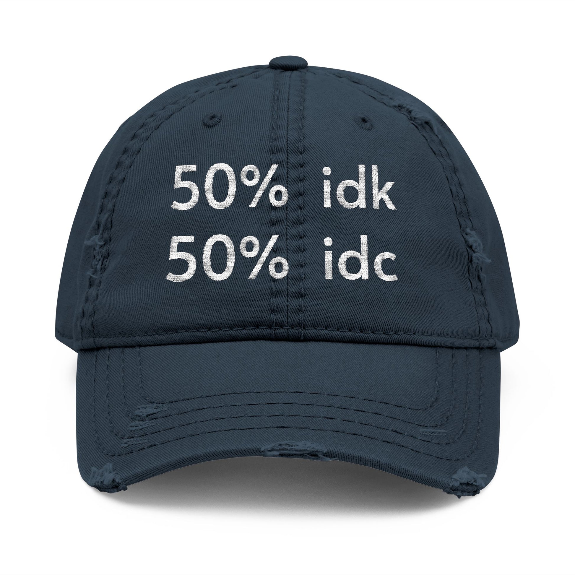 Navy blue cap with white text '50% idk 50% idc' on a white background