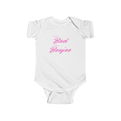 White baby onesie with pink text on a white background