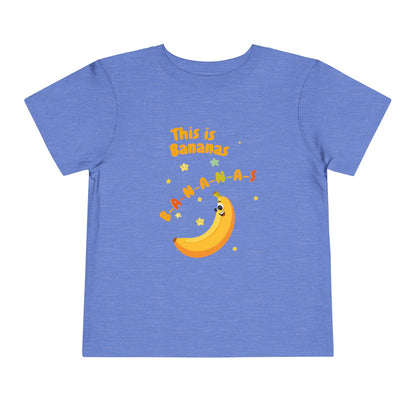 Blue t-shirt with a banana graphic and text on a white background