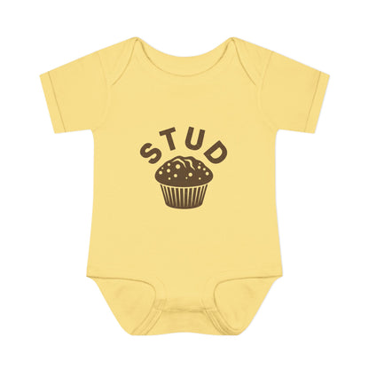 Yellow baby onesie with 'STUD' and a muffin graphic on a white background