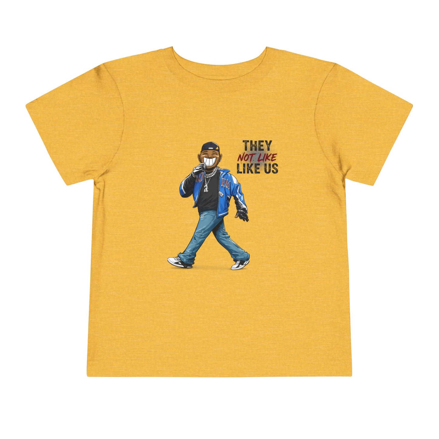 Yellow t-shirt with a graphic of a person wearing a mask and text 'They Like Not Like Us' on a white background