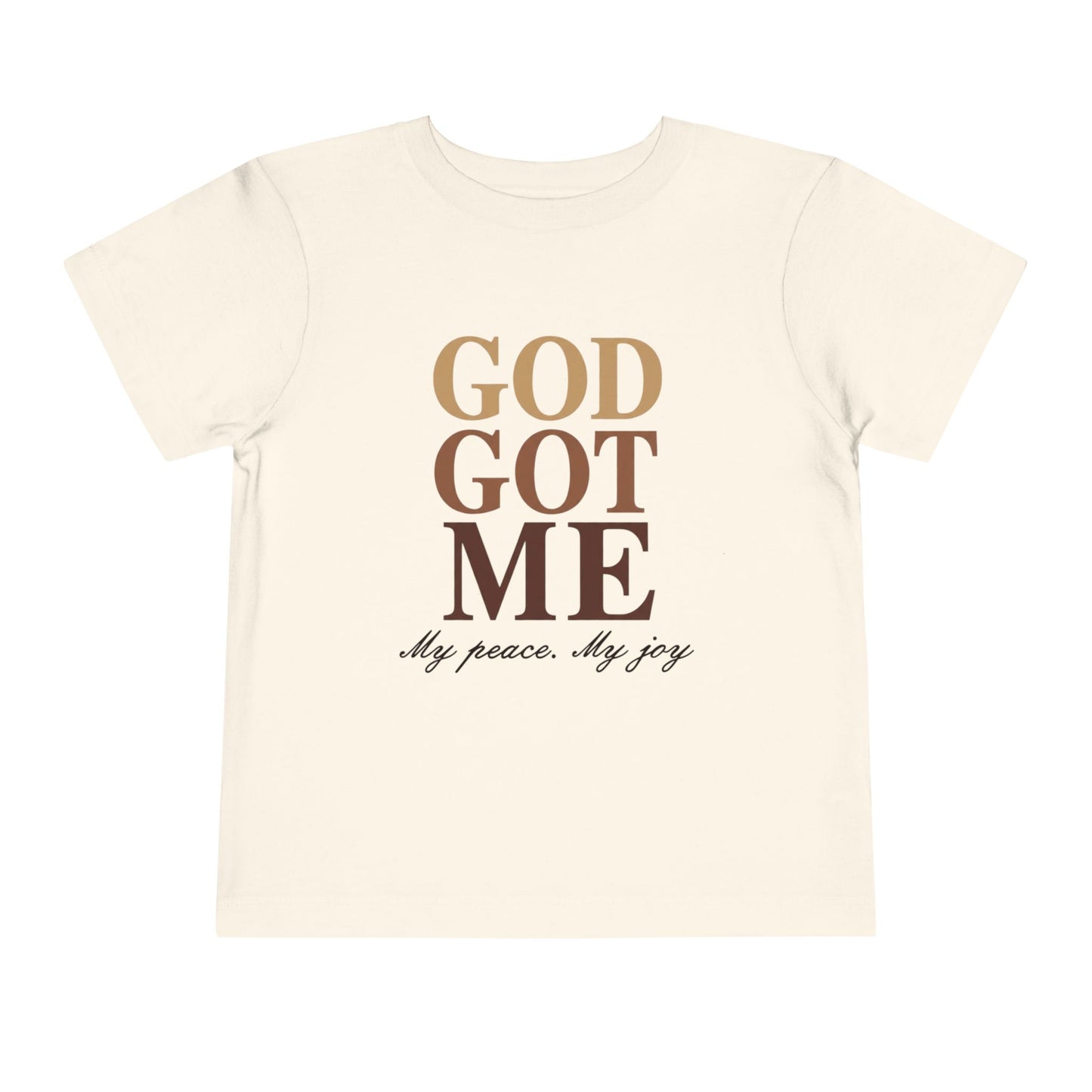 Beige t-shirt with 'God Got Me' text design on a white background