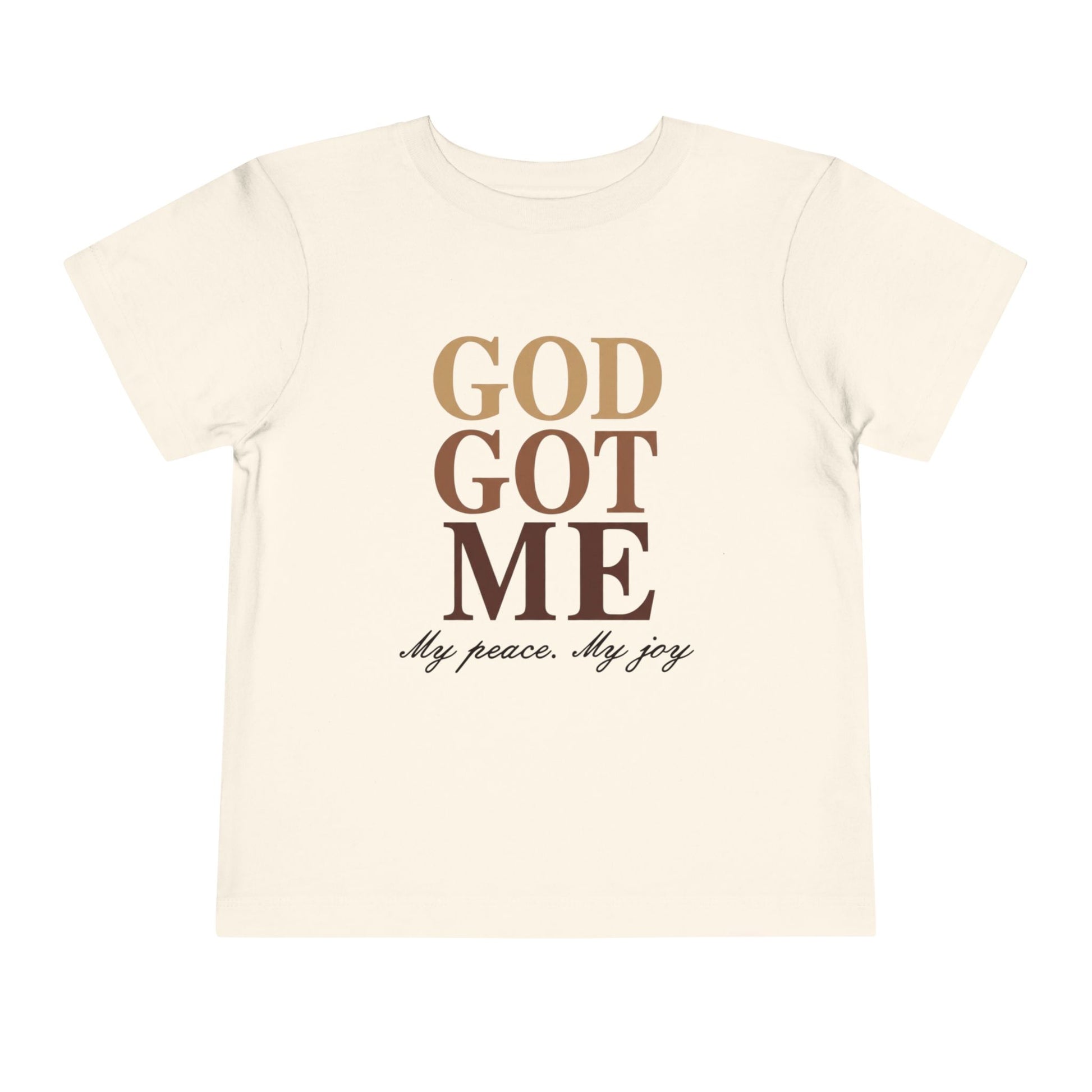 Beige t-shirt with 'God Got Me' text design on a white background