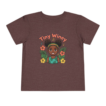 Brown t-shirt with a graphic of a girl and 'Tiny Winey' text on a white background