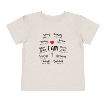 Beige t-shirt with motivational text and symbols on a white background