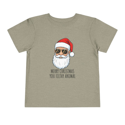 Children's t-shirt with a graphic of a Santa Claus face and sunglasses, featuring the text 'Merry Christmas you filthy animal' on a beige background.