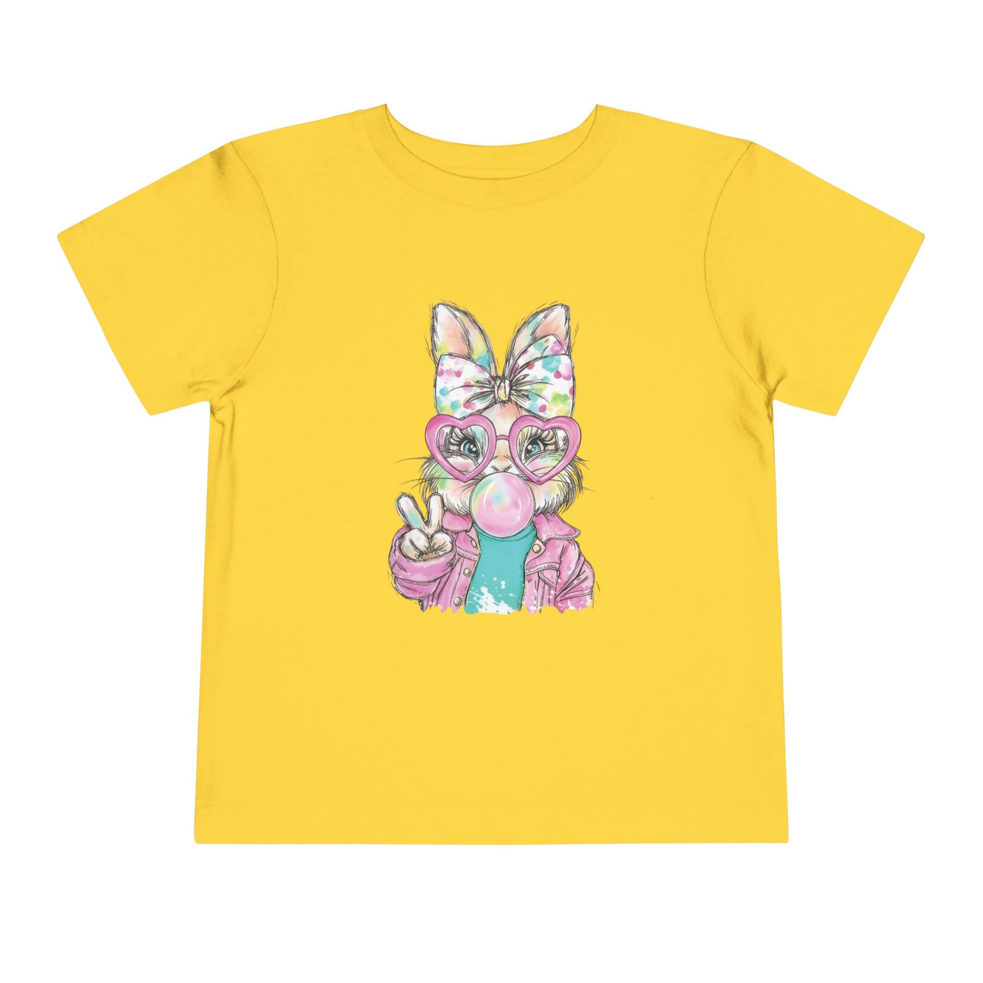 Yellow t-shirt with a cartoon character wearing a bow and glasses on a white background