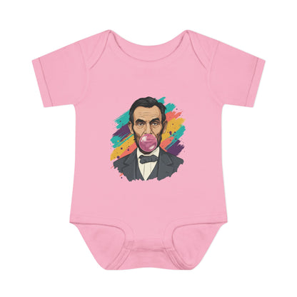 Pink baby onesie with a colorful graphic of a historical figure on a white background