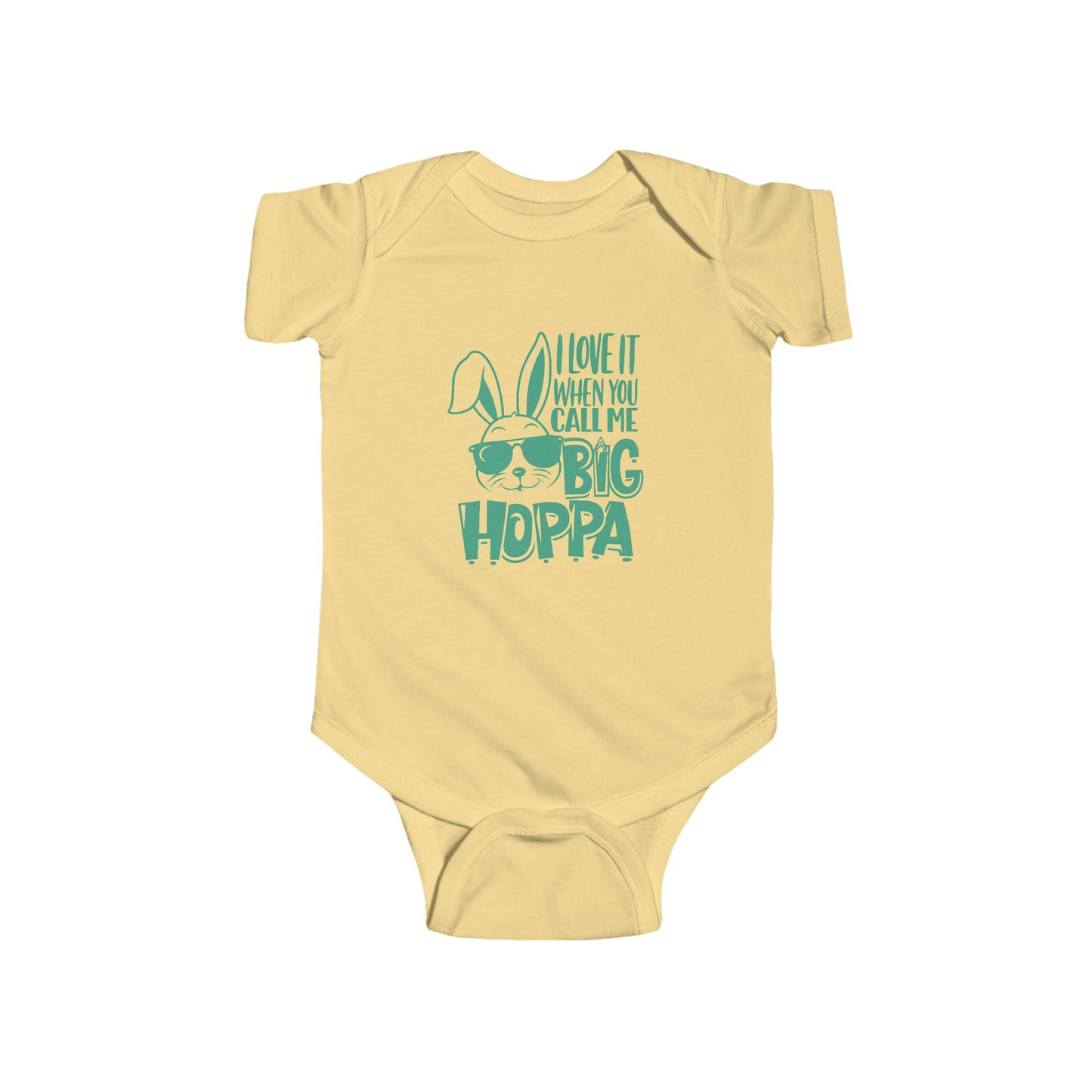 Yellow baby onesie with a green graphic and text on a white background