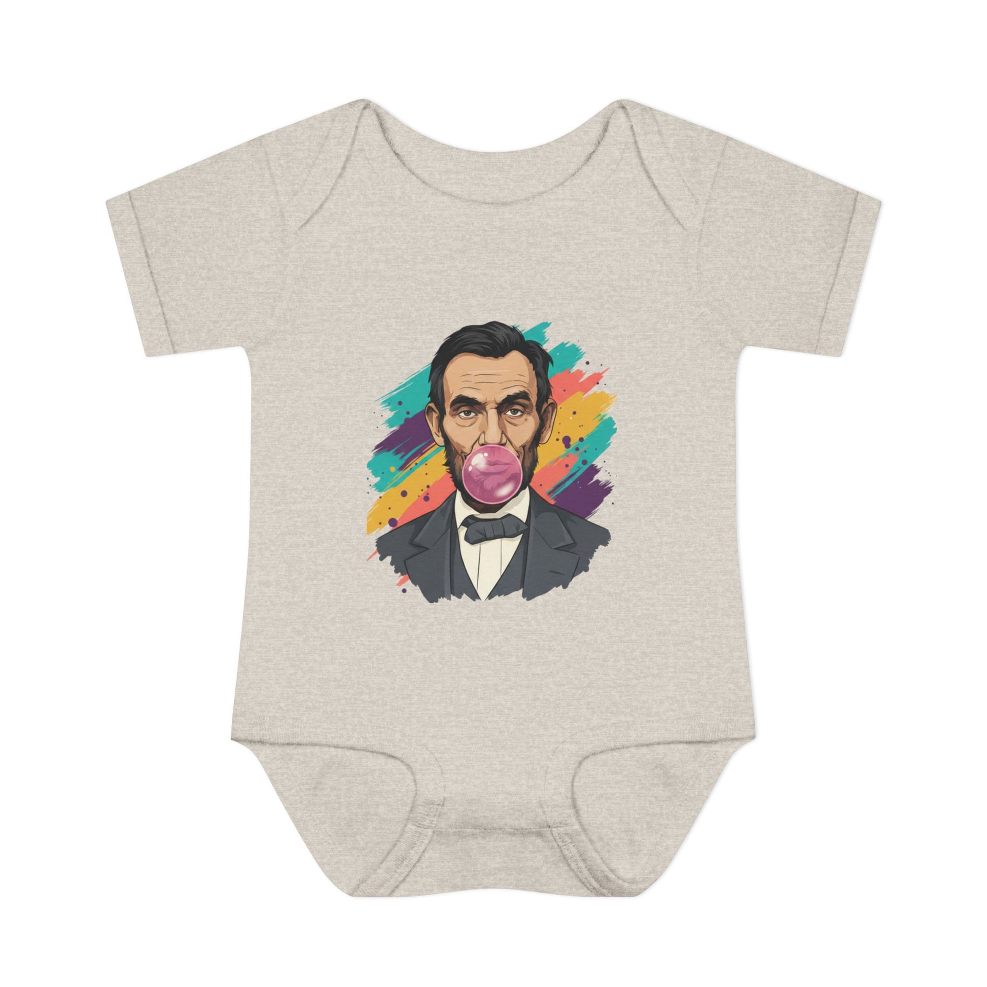 Beige baby onesie with a colorful graphic of a historical figure on a white background