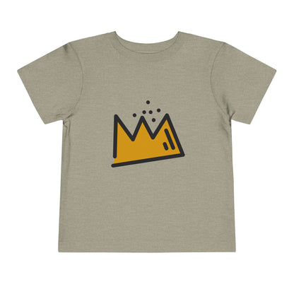 Children's t-shirt with a yellow crown graphic on a beige background
