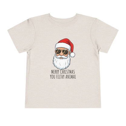Beige t-shirt with a graphic of Santa Claus wearing sunglasses and a red hat, with text 'Merry Christmas you filthy animal' on a white background.