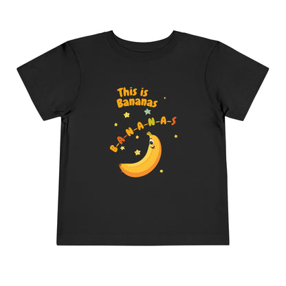 Black t-shirt with a banana-themed design and text on a white background