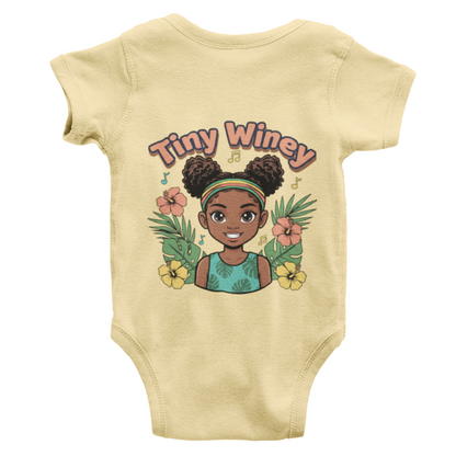 Beige baby onesie with a graphic of a girl and 'Tiny Winey' text on a white background