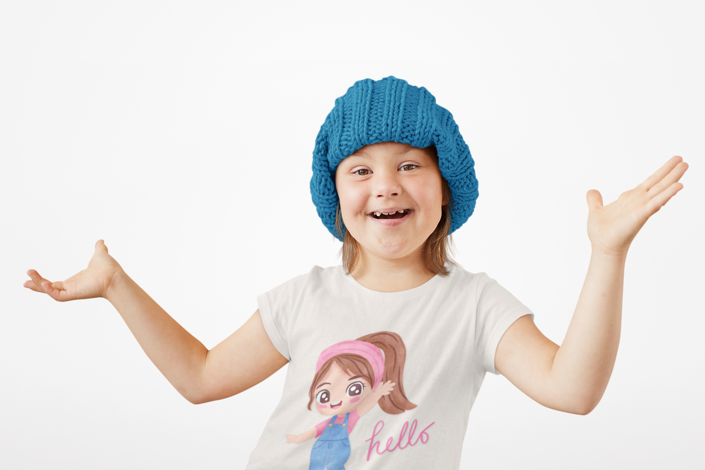 Child wearing a blue knit hat and a white t-shirt with a graphic design on a white background