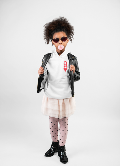 Child wearing a white sweatshirt with a red design, black leather jacket, and pink skirt on a white background