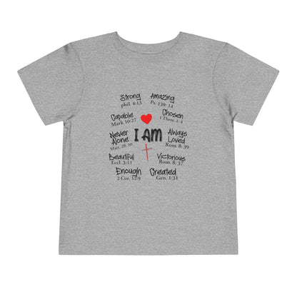 Gray t-shirt with motivational text and a red heart on a white background