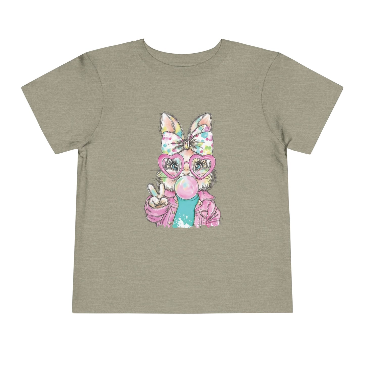 Children's t-shirt with a cartoon character wearing a colorful bow and glasses on a beige background