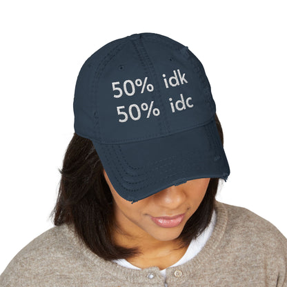 Person wearing a navy blue cap with text on a white background