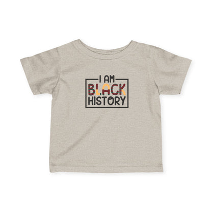 Beige t-shirt with 'I AM BLACK HISTORY' text on a white background