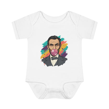 White baby onesie with a colorful graphic of a historical figure on a white background