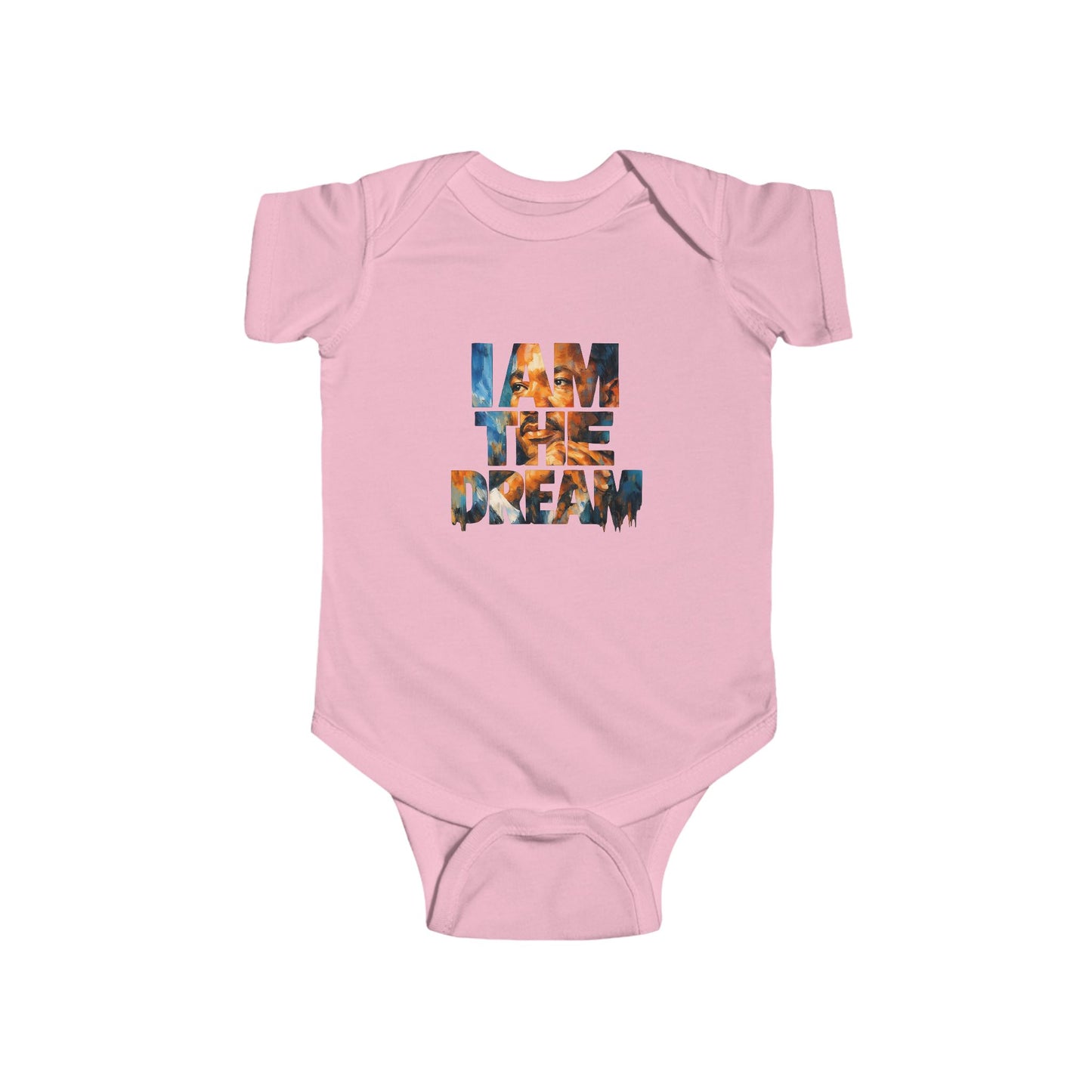 Pink baby onesie with 'I AM THE DREAM' text on a white background